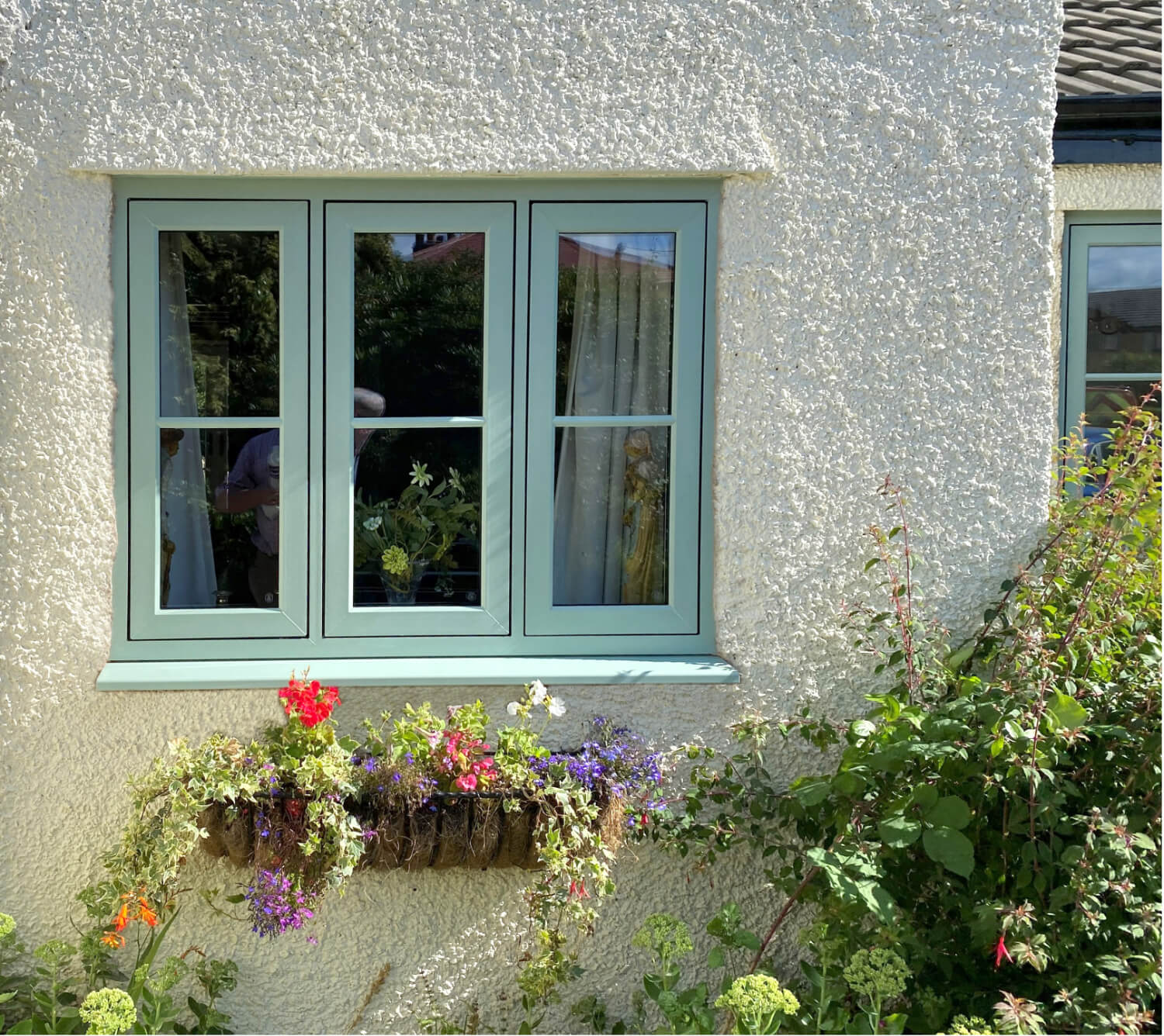 High-performance uPVC casement window installation detail showing a crisp external finish.